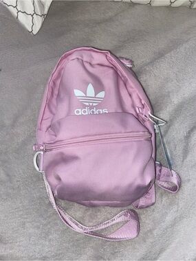 Pink mini crossbody backpack